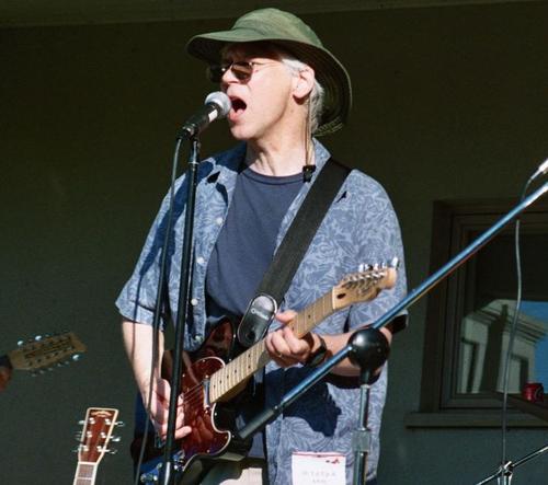 husband~dad~lawyer~reader~guitar player~made up a few songs....