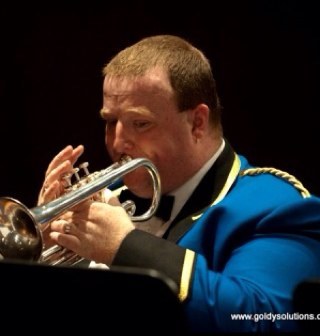 GP Old Machar Medical Practice, Aberdeen. Fanatical cornet player with Bon accord silver band. married to karen with 2 children