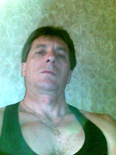 50-186-85 Brown-haired person, eyes grey-dark blue