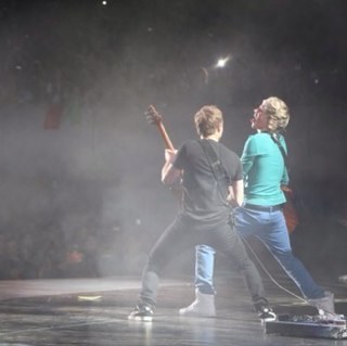 i'm Niall, i'm in one direction. i sing and play a instrument. with 6 strings on it!!  BUT IM A PARADOY ACCOUNT SORRY