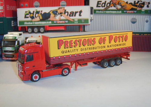 I Make Containers from Card in OO,HO,N gauge & N scale + Z. I love making 'Stobart' Containers as the Colours are Vibrant. The picture is my latest Project.