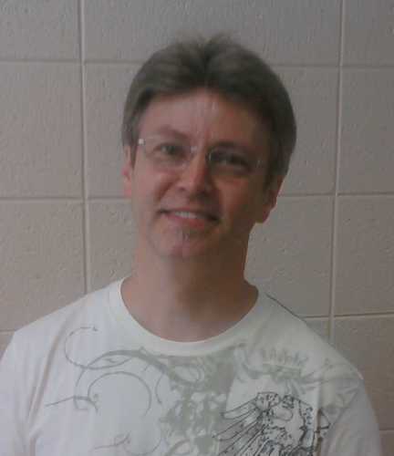 I'm a person. A male person. A short male person.
Who happens to be a high school & college teacher. A computer programming, law & management teacher.