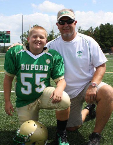 Diehard Dawg fan and Love coaching youth football at Buford.