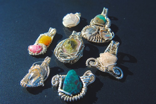 Merchant & Founders of IsAlien Bling (Bristol). We have One-Of-A-Kind Jewellery designs using semi-precious stones that are wire wrapped to the highest quality.