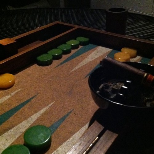 Backgammon, a good cigar and a provocative jest.