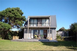 Absolute beach front ~ Simpson's Beach, Whitianga on the Coromandel Peninsula in beautiful New Zealand. Click the webpage to contact us about a booking