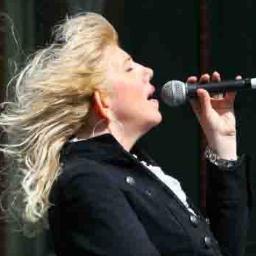 I am a singer with the band Friends of Tom. Completely different than people expect...I take them by surprise.