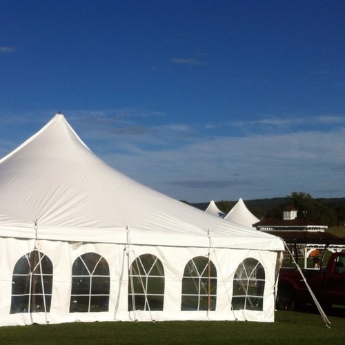 Meeting all your wedding, corporate, commercial, and private tent rental needs. Tables, chairs, lighting, staging, and more!