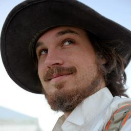 Definitely a builder, occasionally a philosopher, something of a poet.

Ruby, Scala, and phenomenological quips.
