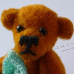 I love fabrics, felt and embroidery. I make miniature teddy bears, and many other things, mostly because they make me smile. I hope they make you smile too.