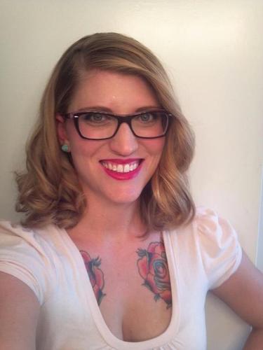 Mom, sister, friend, artist, Disney lover, photo taker, tattooed, fun, crazy, talentless dancer, bad karaoker, friend to furry things, sushi eater.