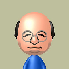 I am a short, stocky, slow-witted, bald man. Also known as Costanza, lord of the idiots