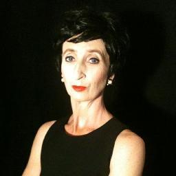 mama, artist filmmaker, curator, host of Mama Loveys Film Salon, performer and doughnut fan