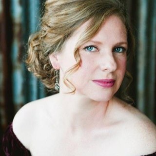 Singer. Mother of two. Still loving living in London.