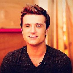 »Because she came here with me»  
Josh Hutcherson/Peeta Mellark fan page, yup.
#HungerGames kicks ass, your argument is invalid.