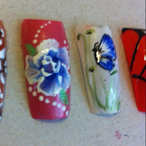 hand painted and custom nail art, full set of gel nails £20 with nail art £25-30. Infills £15 with art- £18