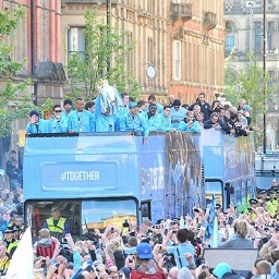 follow us, than we will tell the MCFC account or one of the city players to follow you 
ps: if this doesn't work, remind us by mentioning