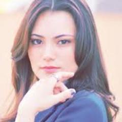 Official profile of singer and actress Angela duscio