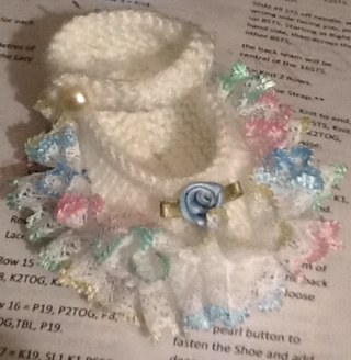 BabyBootiful's profile picture. Hand knitted baby shoes and other accessories.