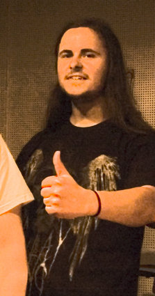 Lärare, metal, magic and the occasional swing at the guitar.