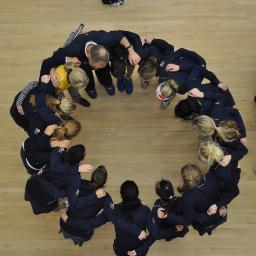Trinity Women's squash team.Together Everyone Achieves More.
