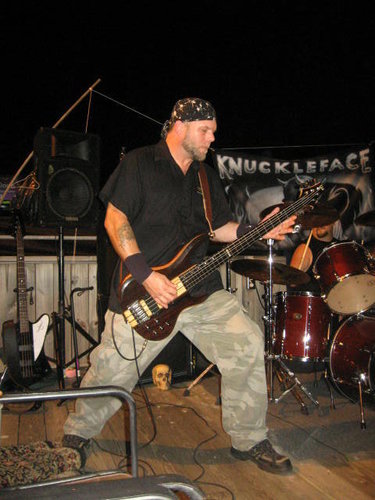 meat cutter by trade and  bassist/songwriter for myrtle beach sc based metal group Knuckleface