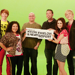 We are the creators of the Disney Channel series Austin & Ally. 
Our middle name is Monica. Both of ours.