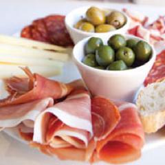 Spanish Deli & Cafe! Come in for breakfast or lunch. We have coffee, cakes, fresh sandwiches with your choice of meats, antipasto platters and much more!