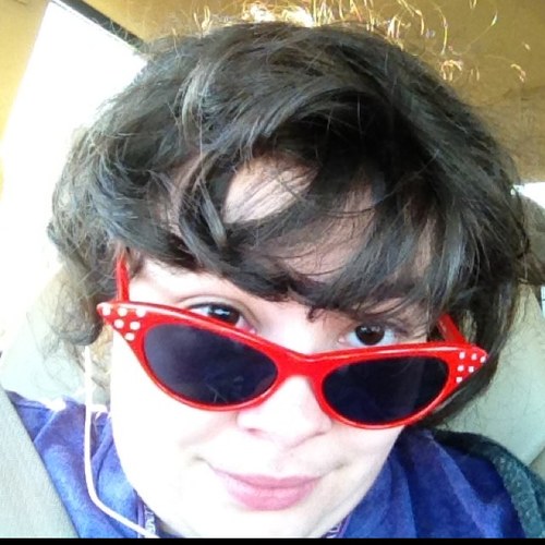 Aspiring singer, actress, writer, artist, and major fan, all wrapped up in a pint-sized college student.