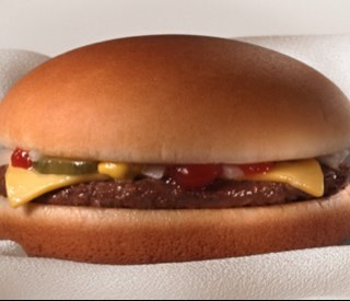 Im the cheeseburger! ask yourselves Where did it all begin?I can answer that. It is I the 99p cheese burger 1 bun 1 burger cheese onion gerkin and tomato sauce!