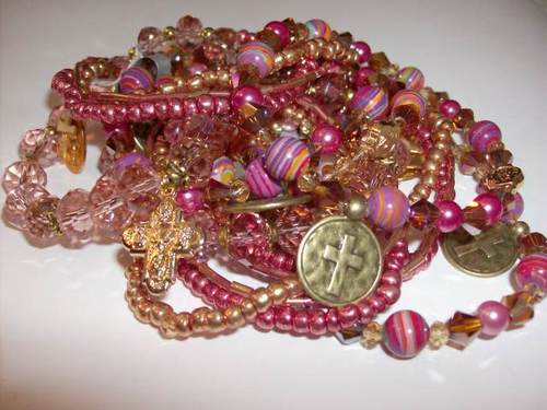 OZY, the next generation rosary, a 1-5 decade rosary for men women & teens. Slips off 2 pray on-the-go Includes the Miraculous Medal. http://t.co/qKZ5prWzCC