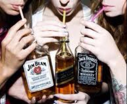 Two girls shootin' whiskey like a cowboy.
