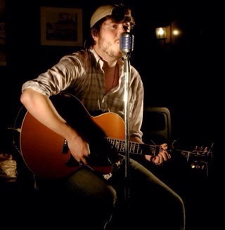 Sorta like Being John Malkovich, but Malkovich got replaced by some hack with a guitar.