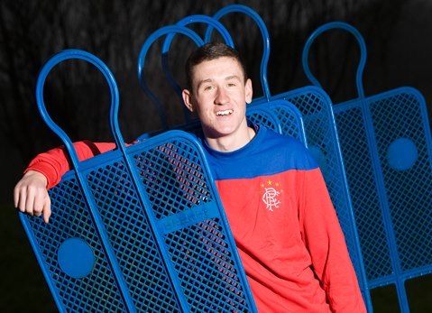 Professional footballer at Rangers FC.