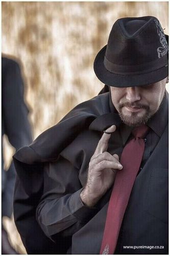 Son of The Living God, father of Jayden, married to Bronwen, drummer at St Pauls, business owner.