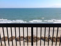 Oceanfront King Suite at Compass Cove Resort in Myrtle Beach South Carolina. King bed, Full Kitchen, Double Murphy Bed & Pull Out Couch. Sleeps 6. Pet Friendly!