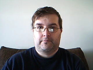 Loves to read, watch classic TV and game shows, cat lover, married, father to a daughter,  KC sports fan, Atari 2600 fanatic, building a 1974 Topps Baseball set