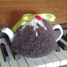 KookyKnits's profile picture. Lovingly hand-crafted funky, yet reassuringly wholesome, individually knitted tea cosies, hats and handbags created from silk, alpaca & pure British wool by me!