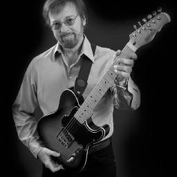 Guitar player, producer, father.