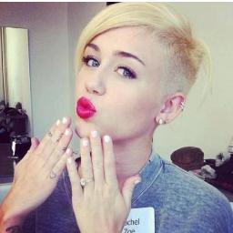 Roses are red, Violets are blue. Hater of Miley You belong in the zoo. Don't be mad, I'll be there too. Not in the cage. But laughing at you.