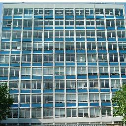 11 Storeys of Offices, gym and restaurant - 1960 Concrete & glass office Building - Expressing own views