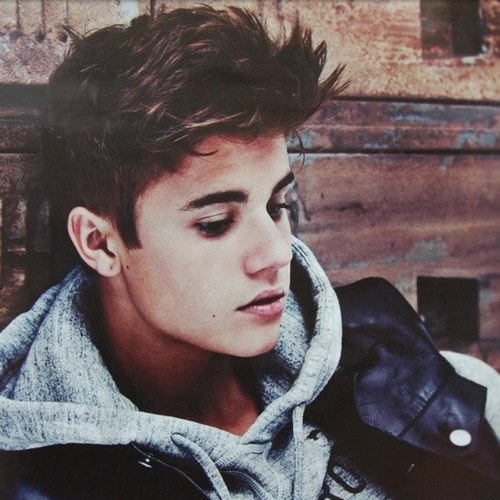 then I saw his face, now I'm a belieber! strong belieber:) kidrauhl is my heart :) met justin 1/15/13 and he was flawless.