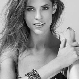 I am left-handed, hopelessly messy and occasionally insomniatic. I model for Next Models, but that doesn't define me.