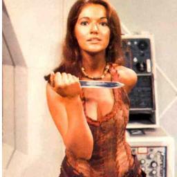 Mad...man? Im Leela of the Sevateem. We are not used to the new..people. I tra-vel with the Doc-tor and K...K-9