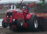 The Pure Country Tractor is a 8480 Massey Ferguson with a 3 Turbo Charged 640 Perkins V8, on Alcohol producing around 3,800 HP,