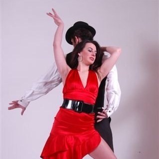 Professional dancer, Director of Salsa Caliente Dance Company and host of Salsa Del Barrio Radio.