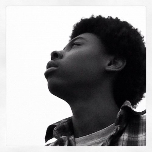 short irresistable dude with the afro....that pretty much sums me up