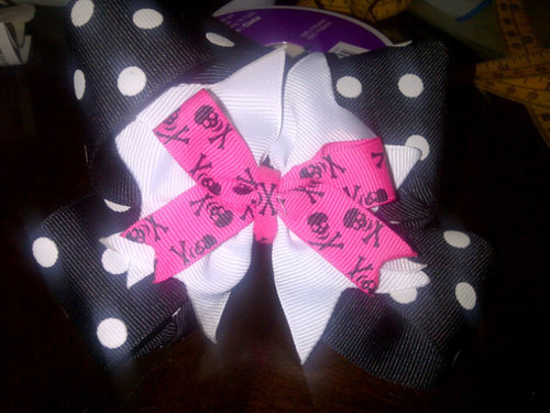 We currently handcraft hairbows, headbands, pillows, blankets & more. Most can be embroidered for personalization. Our website is currently under construction