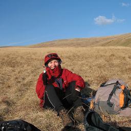 Researcher and horticulturalist, usually outdoors, often muddy