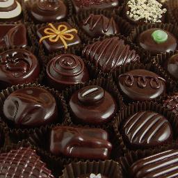 give me chocolate, a hot pack, a boyfriend to rub my back and more chocolate. i feel bloated.